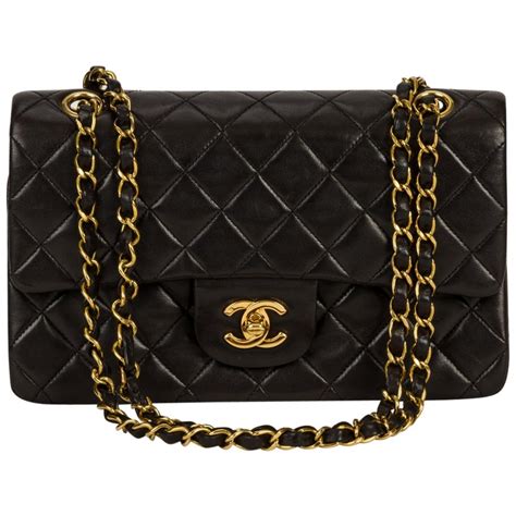 black and gold chanel messenger bag|Chanel black classic flap bag.